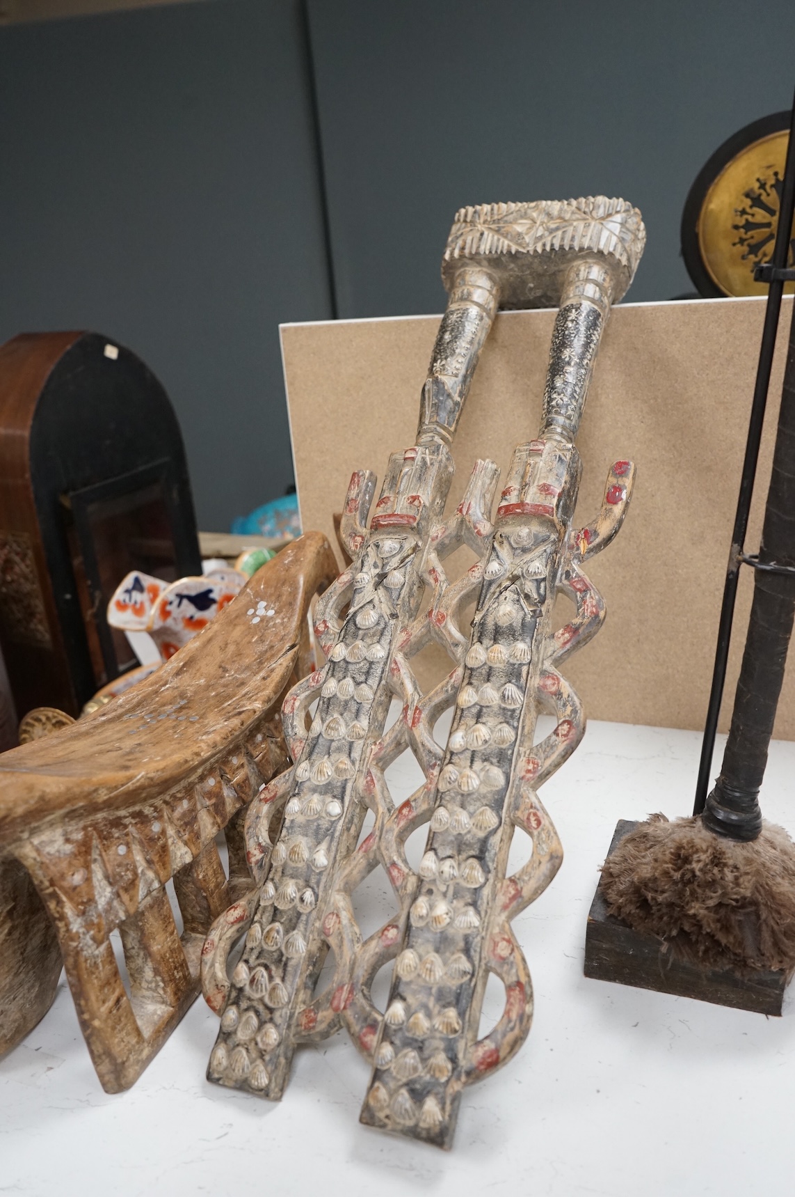 A Zulu painted wood fighting stick, a Nigerian twin group and a headrest (3)